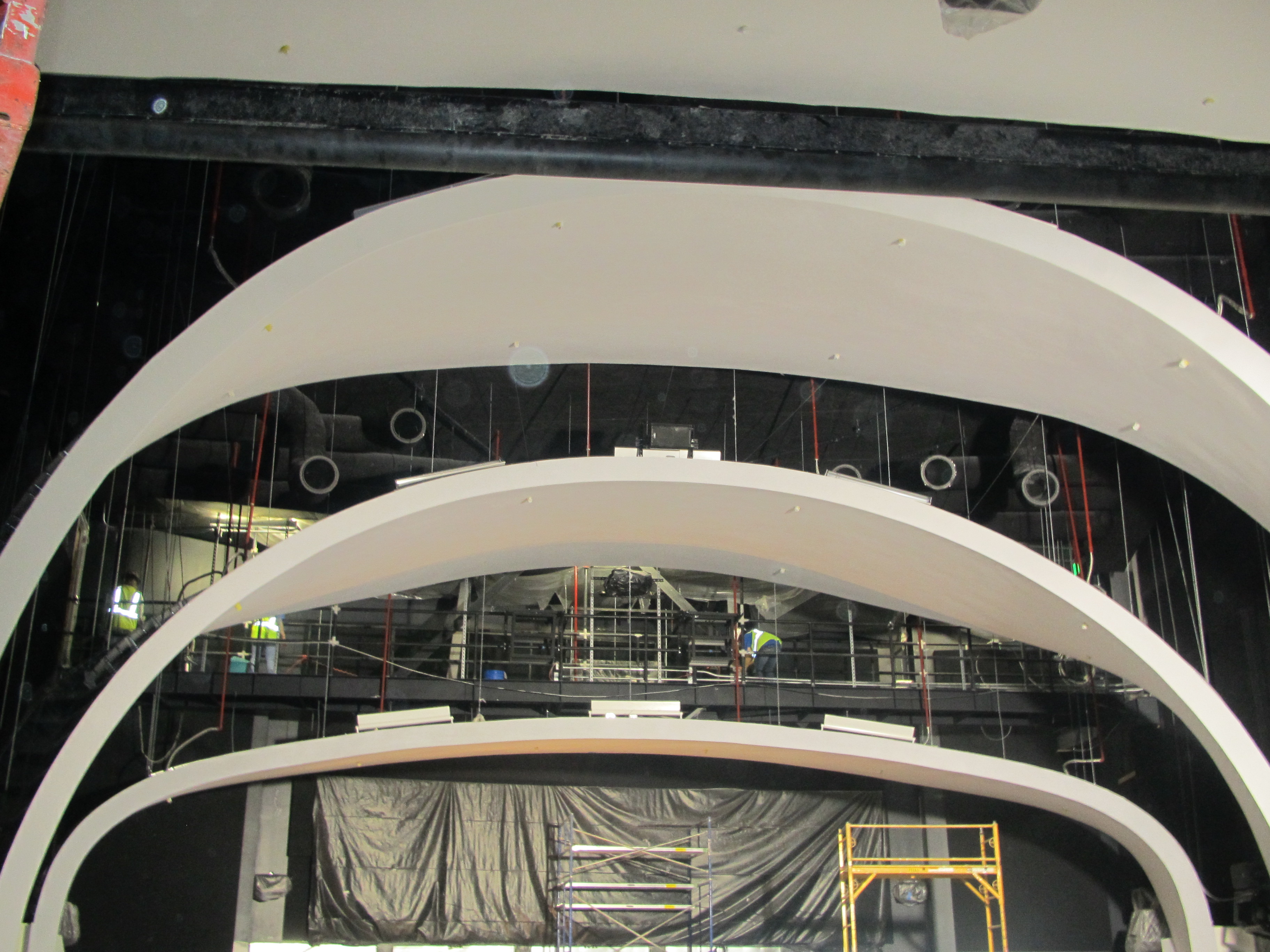 Atlantis Space center Fellert Acoustic Plaster arched Screens
